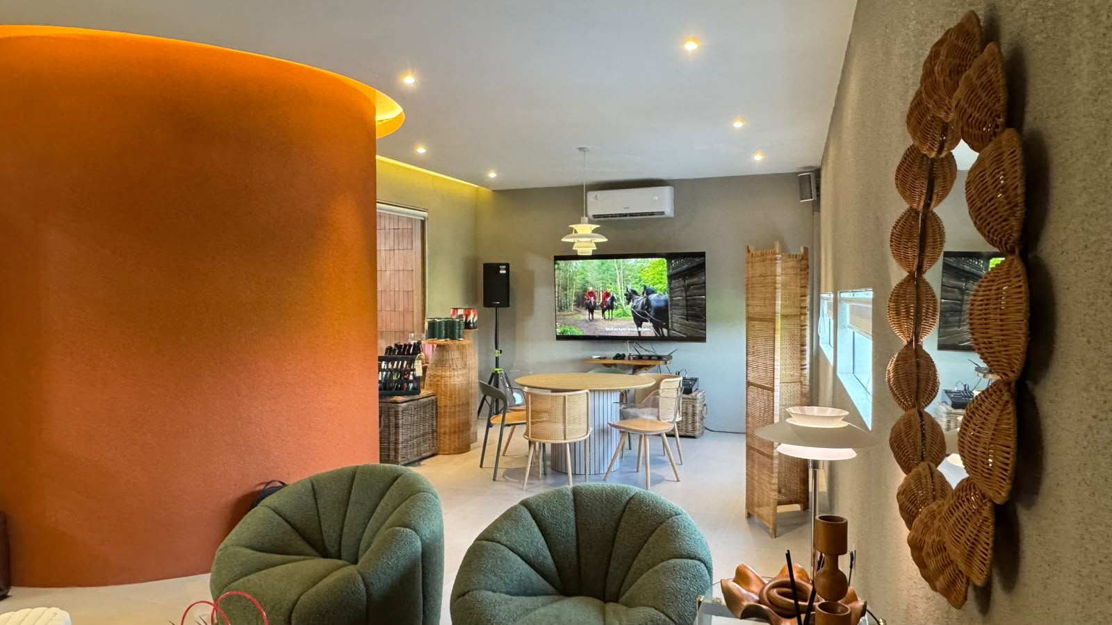Luxury private lounge overlooking the courts with terracotta furniture